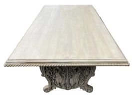 A LARGE DECORATIVE LIME OAK CARVED REFECTORY TABLE The large plank top support on carved and pierc