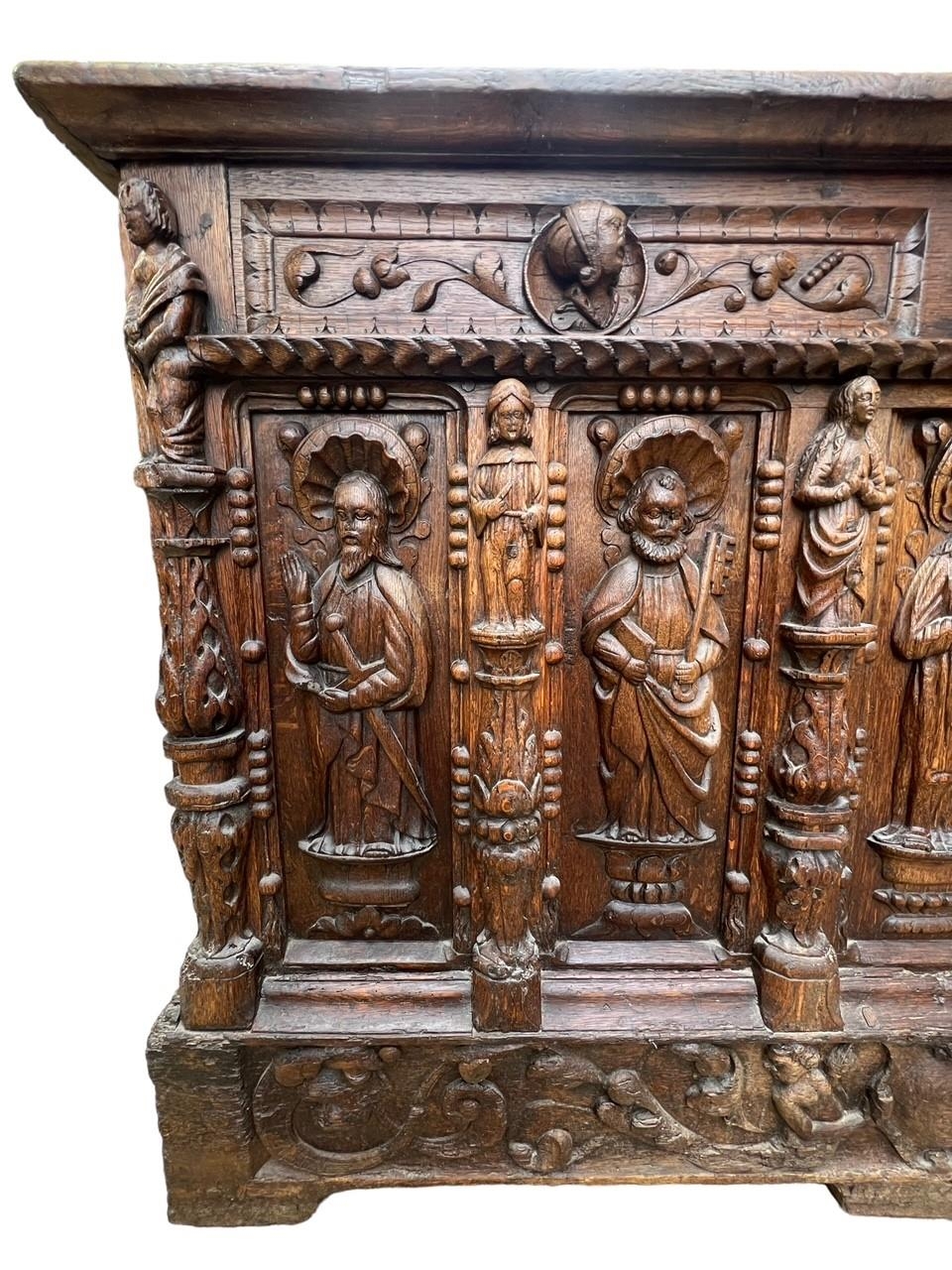 A 16TH CENTURY FRENCH, OAK COFFER with hinged lid above carved freeze decorated with swags and - Image 10 of 13