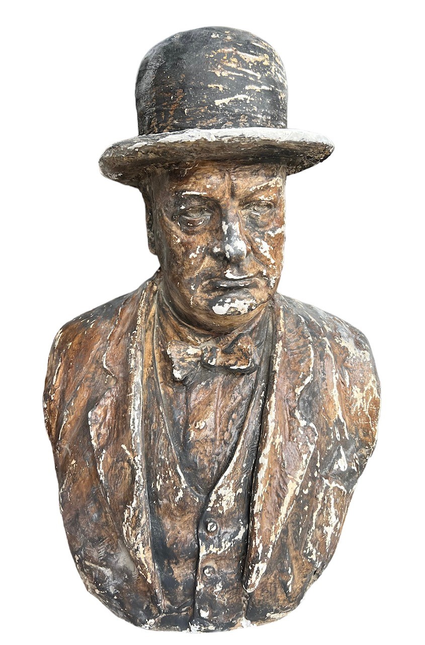 A LARGE PLASTER PORTRAIT BUST OF SIR WINSTON CHURCHILL. (h 66cm x d 34cm x w 44cm)