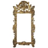 A LARGE 18TH CENTURY FRENCH LOUIS XV ROCOCO CARVED GILTWOOD AND PAINTED PIER MIRROR The framed