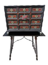 A 17TH CENTURY FLEMISH TORTOISESHELL EBONY AND BONE INLAID TABLE CABINET