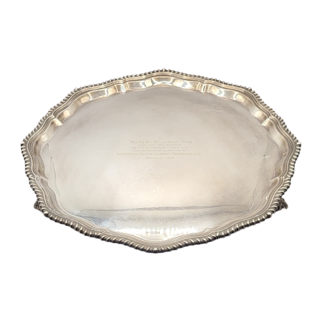 MAPPIN & WEBB LTD, A LARGE SILVER SALVER, RAISED UPON THREE BALL AND CLAW FEET, HALLMARKED
