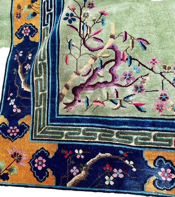 A LARGE DECORATIVE CHINESE CARPET with green ground and floral and flower decoration 275cm x 357cm - Image 2 of 3