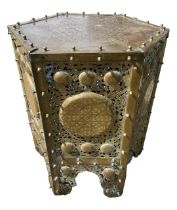 A LARGE ANTIQUE PIERCED CHASED AND ETCHED BRASS ISLAMIC KORAN COFFEE TABLE. (h 70cm x diameter 56cm)