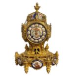 A 19TH CENTURY FRENCH GILT METAL AND PORCELAIN MOUNTED STRIKING MANTEL CLOCK The case modelled