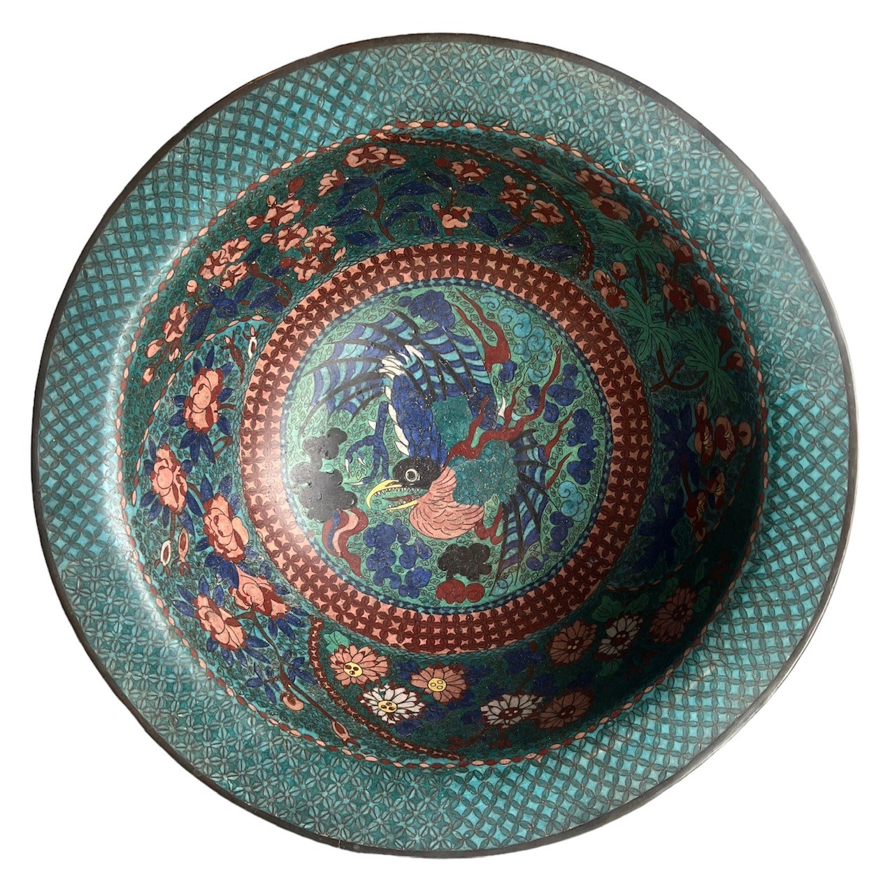 A LARGE CHINESE LATE MING DYNASTY 17TH CENTURY CLOISONNÉ BOWL Of waisted circular form with a flared