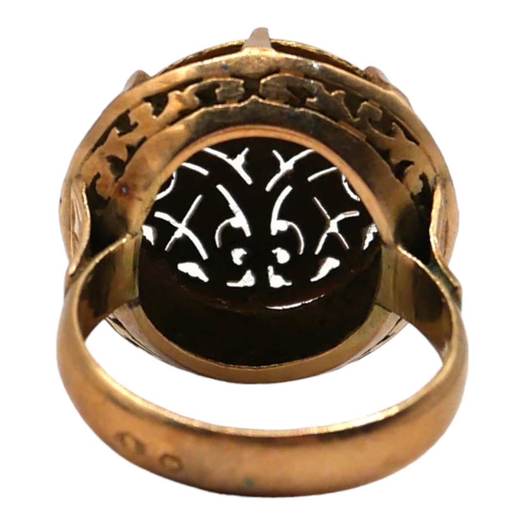 A LARGE POLISH 12CT GOLD COCKTAIL RING Front having extensive chased and pierced scroll - Image 3 of 3