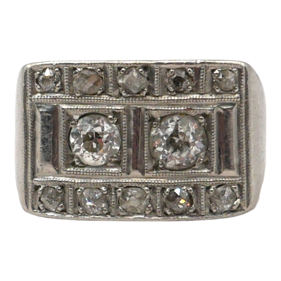 ART DECO WHITE METAL AND DIAMOND RING (WHITE METAL TESTS AS PLATINUM) Having two round old