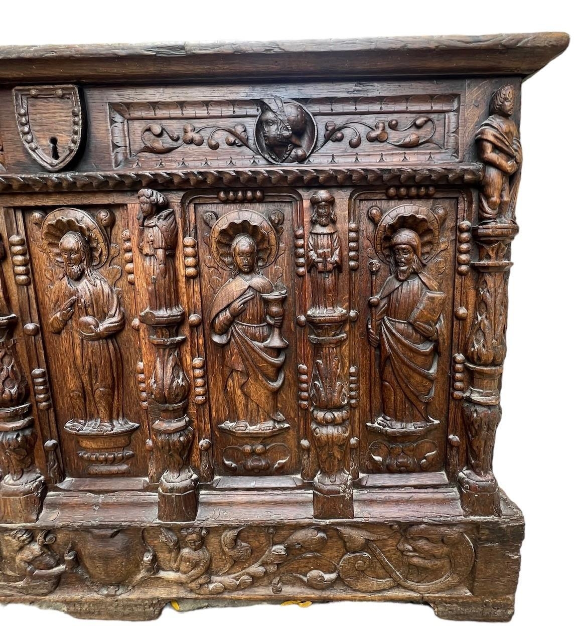 A 16TH CENTURY FRENCH, OAK COFFER with hinged lid above carved freeze decorated with swags and - Image 12 of 13