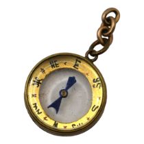 WILLIAM OAKLEY DAVIES, AN EDWARDIAN 9CT GOLD MOUNTED COMPASS, HALLMARKED BIRMINGHAM 1909. (