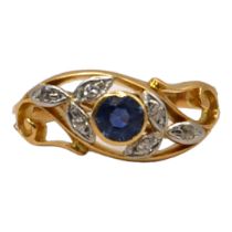 A VINTAGE YELLOW METAL, BLUE TOPAZ AND DIAMOND FLORAL STYLE RING, YELLOW METAL TESTED AS 18CT YELLOW