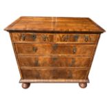 A WILLIAM AND MARY FIGURED WALNUT AND HERRINGBONE INLAY CHEST Two short over three long graduated