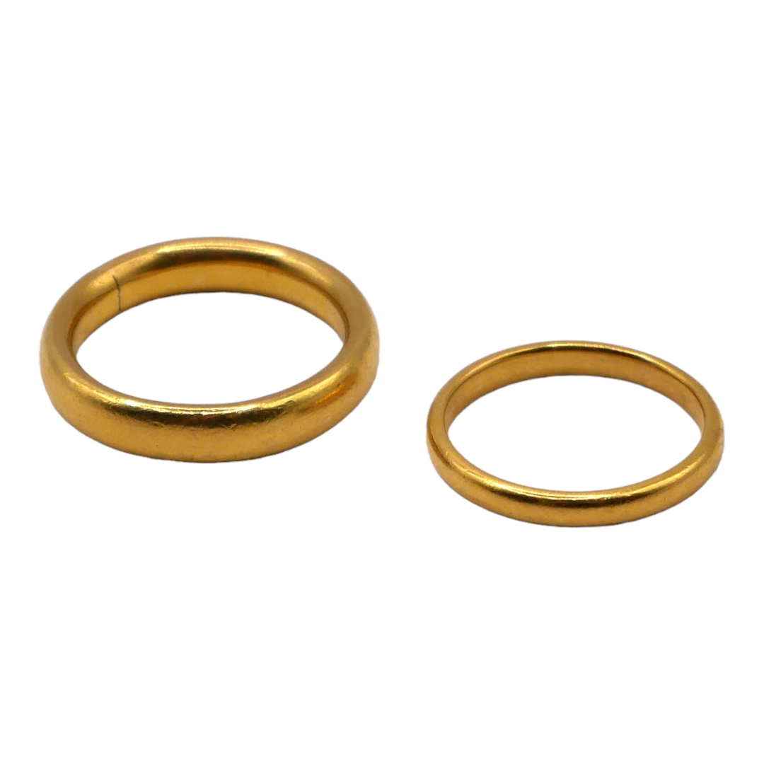 TWO 22CT GOLD BAND RINGS. (UK ring sizes I & L, 9.4g)