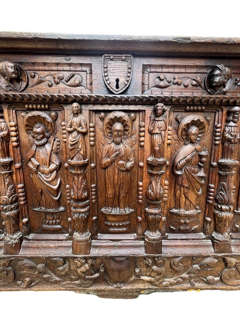 A 16TH CENTURY FRENCH, OAK COFFER with hinged lid above carved freeze decorated with swags and - Image 11 of 13