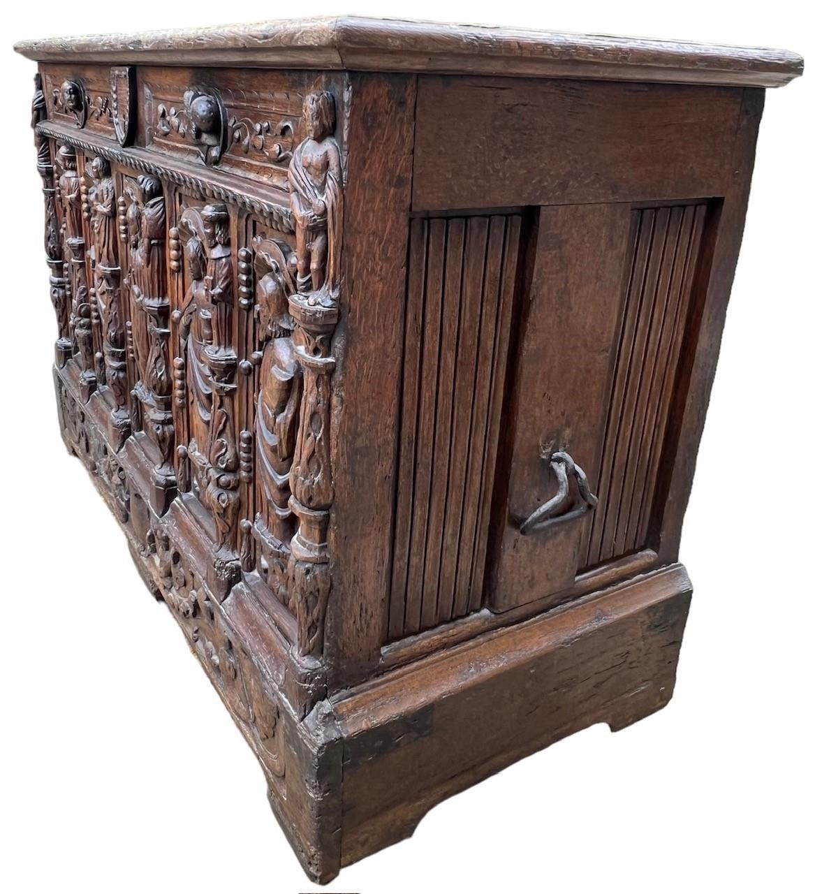 A 16TH CENTURY FRENCH, OAK COFFER with hinged lid above carved freeze decorated with swags and - Image 3 of 13