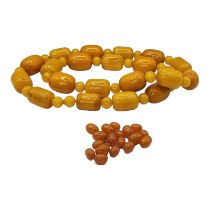 A VINTAGE BUTTERSCOTCH RECTANGULAR AMBER NECKLACE Beads with spherical spacers links, together