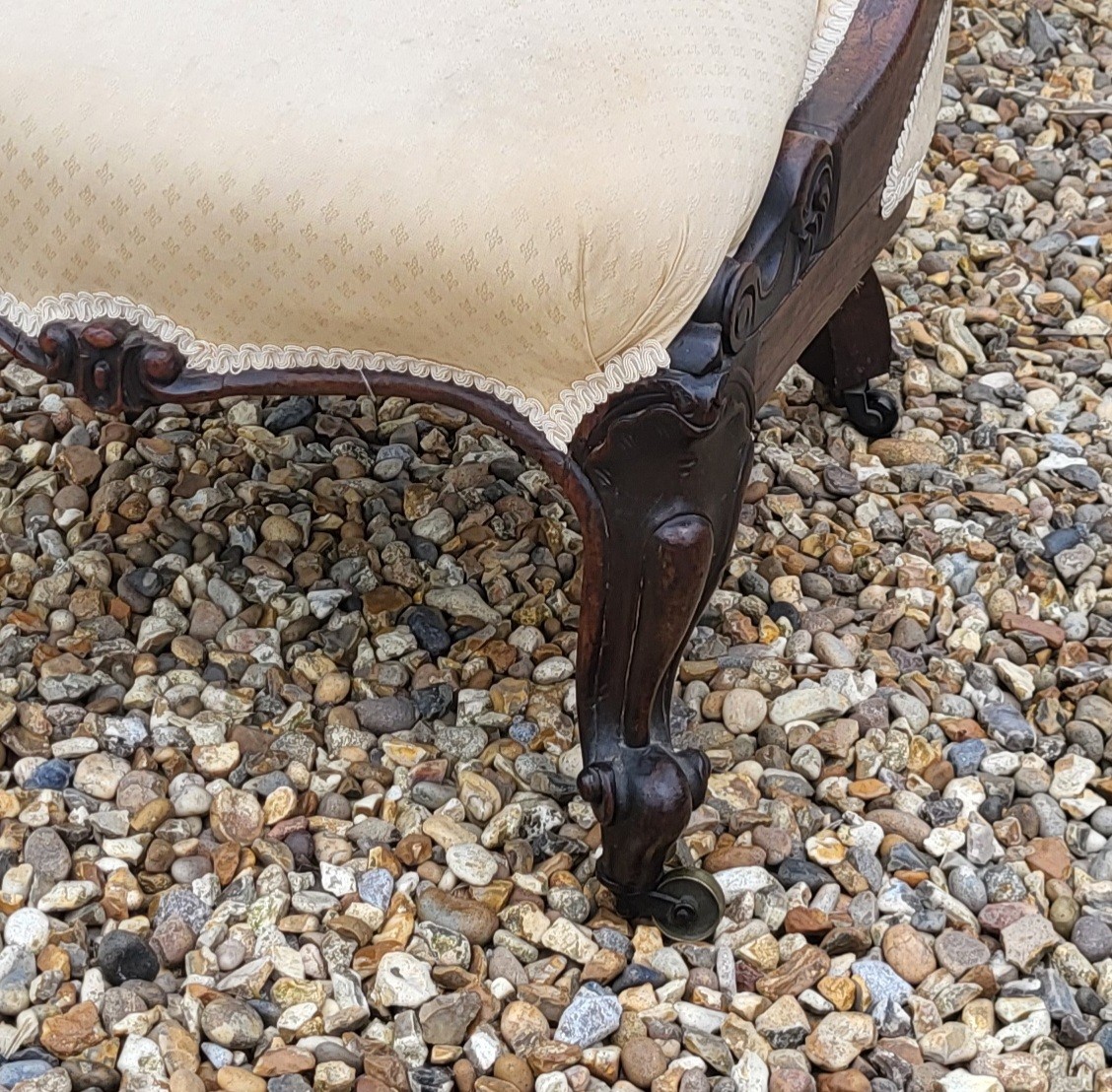 A VICTORIAN ROSEWOOD LOW CHAIR Having cream upholstery with scrolled back and carved cabriole legs - Image 3 of 3