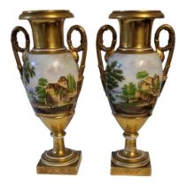 A PAIR OF EARLY 19TH CENTURY CONTINENTAL PORCELAIN CAMPANA SHAPED TWIN HANDLED PEDESTAL VASES