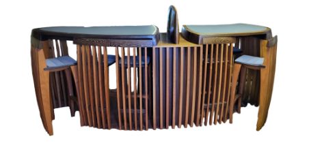 ALUN HESLOP, B. 1971, A STYLISH TROPICAL WENGE WOOD AND BEECH SHOPS COUNTER With grey faux