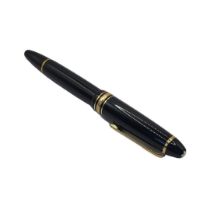 MONTBLANC, A VINTAGE FOUNTAIN PEN Black case with gilt mounts, marked ‘Meisterstruck no 146’, having