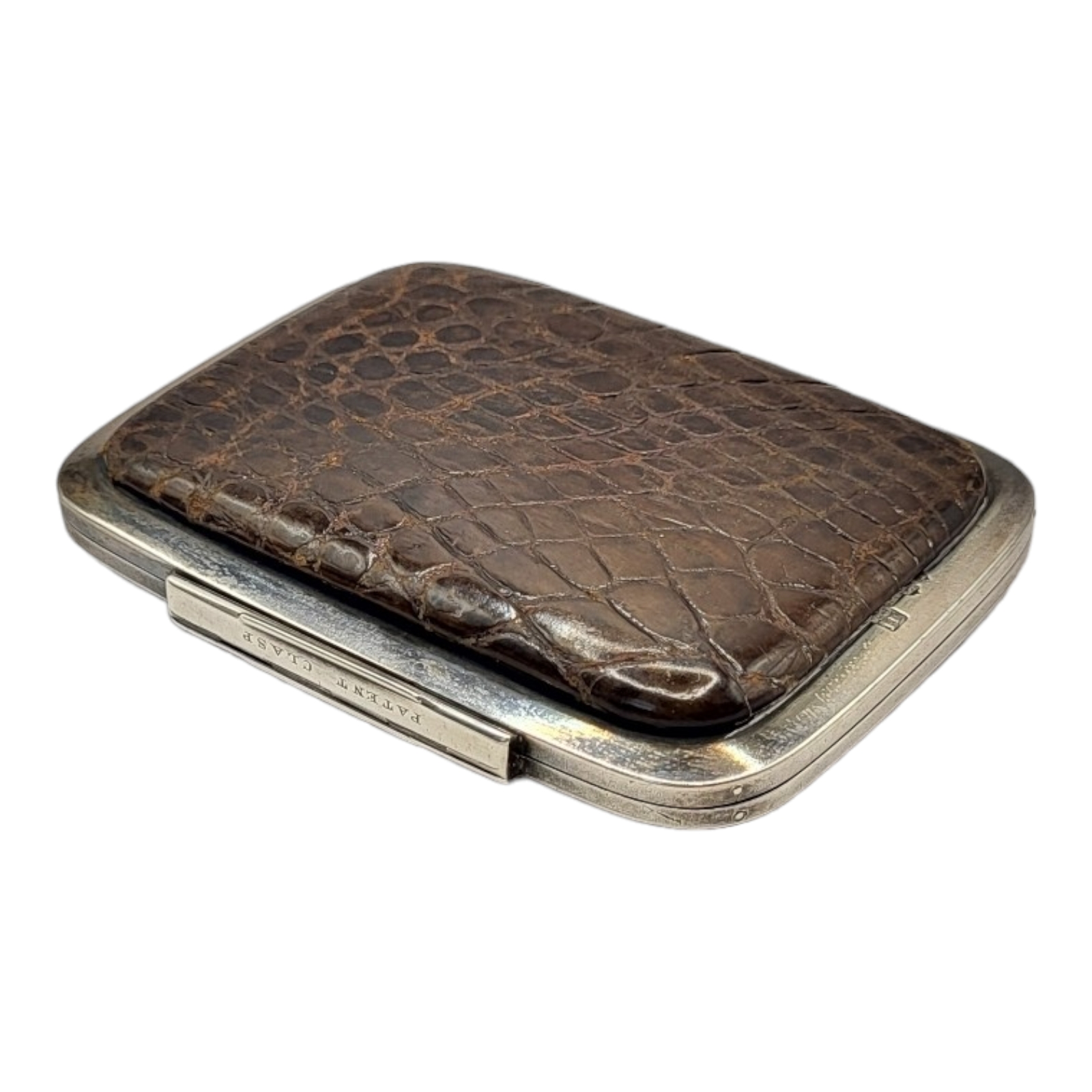JENNER AND KNEWSTUB, LONDON, A VICTORIAN SILVER AND SNAKE SKIN RECTANGULAR PURSE Hallmarked with