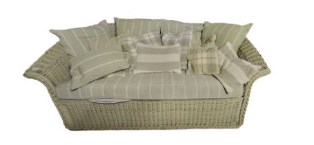 MARSTON LANGINGER, AN ENGLISH WILLOW PALE JADE CONSERVATORY SETTEE Three seat, complete with loose