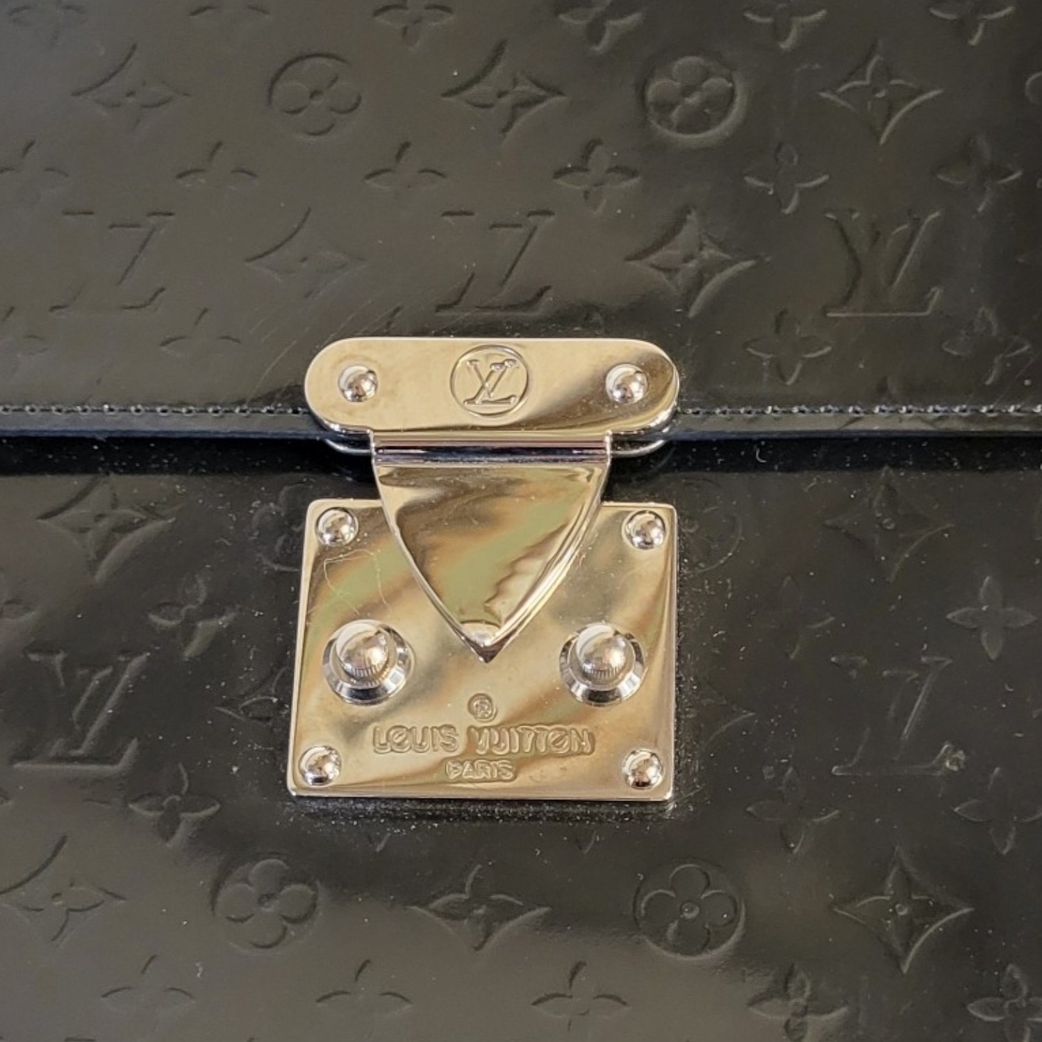 LOUIS VUITTON, A BLACK LEATHER HANDBAG Having a single handle and LV monogram design, in a brown - Image 5 of 9