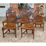 A SET OF EIGHT GEORGIAN HEPPLEWHITE DESIGN MAHOGANY DINING CHAIRS Fan shaped splats with carved