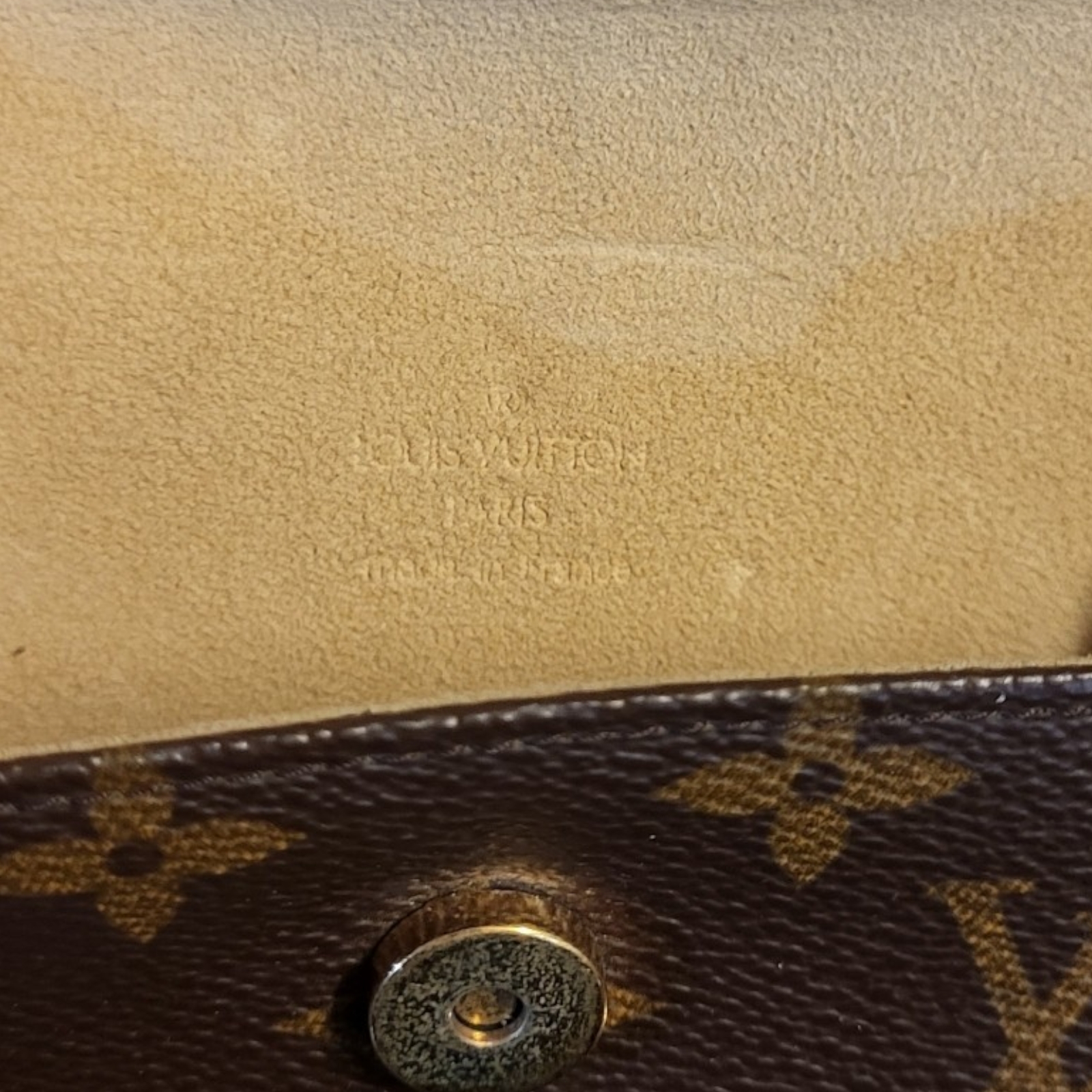 LOUIS VUITTON, A VINTAGE BROWN LEATHER CLUTCH PURSE Having a single handle and LV monogram, in a - Image 8 of 9