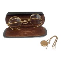 A PAIR OF VICTORIAN YELLOW METAL PINCE NEZ SPECTACLES In a protective box, together with a 9ct