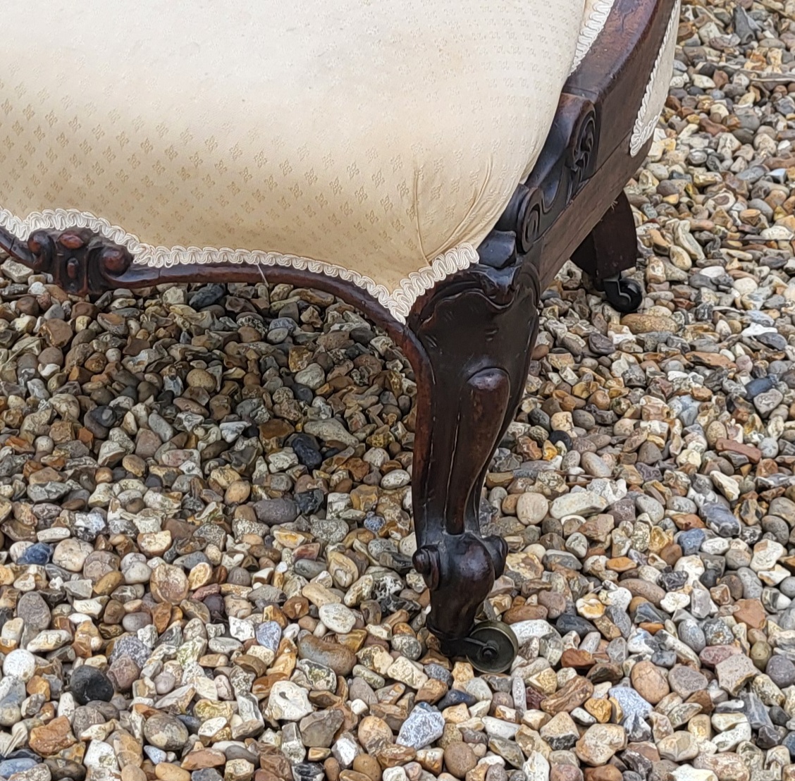 A VICTORIAN ROSEWOOD LOW CHAIR Having cream upholstery with scrolled back and carved cabriole legs - Image 2 of 3