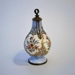 A 19TH CENTURY CONTINENTAL ENAMEL ON GILT METAL SCENT BOTTLE Ovoid form, fine floral decoration with