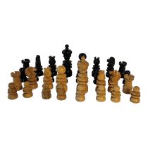 A LATE VICTORIAN/EARLY EDWARDIAN EBONY AND BOXWOOD CHESS SET In Old English pattern, retailed by