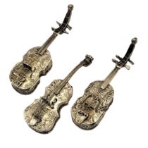 A COLLECTION OF THREE 19TH CENTURY CONTINENTAL SILVER NOVELTY CELLO PILL BOXES Having a hinged