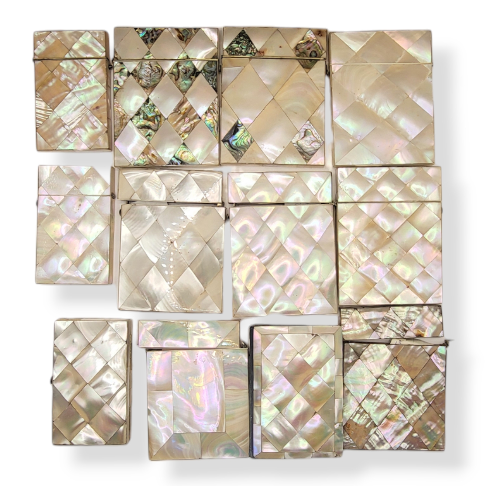 A COLLECTION OF TWELVE 19TH CENTURY MOTHER OF PEARL CALLING CARD CASES Having diamond lozenge