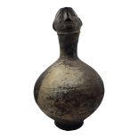 AN AFRICAN AGNO POTTERY ANTHROPOMORPHIC VESSEL WITH HEAD FINIAL Bulbous body with incised