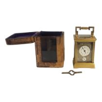 A FINE 19TH CENTURY FRENCH GILT BRASS CARRIAGE CLOCK/TIMEPIECE Enamelled chapter ring with Roman