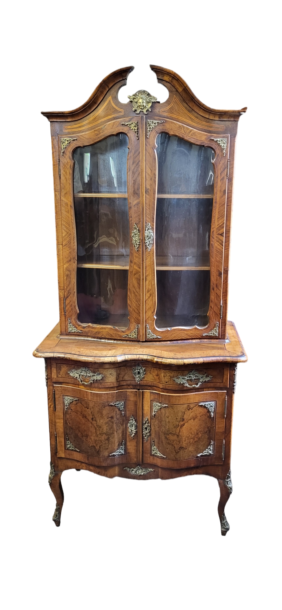 A 19TH CENTURY DUTCH FIGURED WALNUT SIDE CABINET Applied with decorative brass mounts, the swan neck