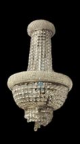 A CHROME AND CRYSTAL CUT GLASS THREE BRANCH BASKET FORM CHANDELIER Hung with graduated uniform