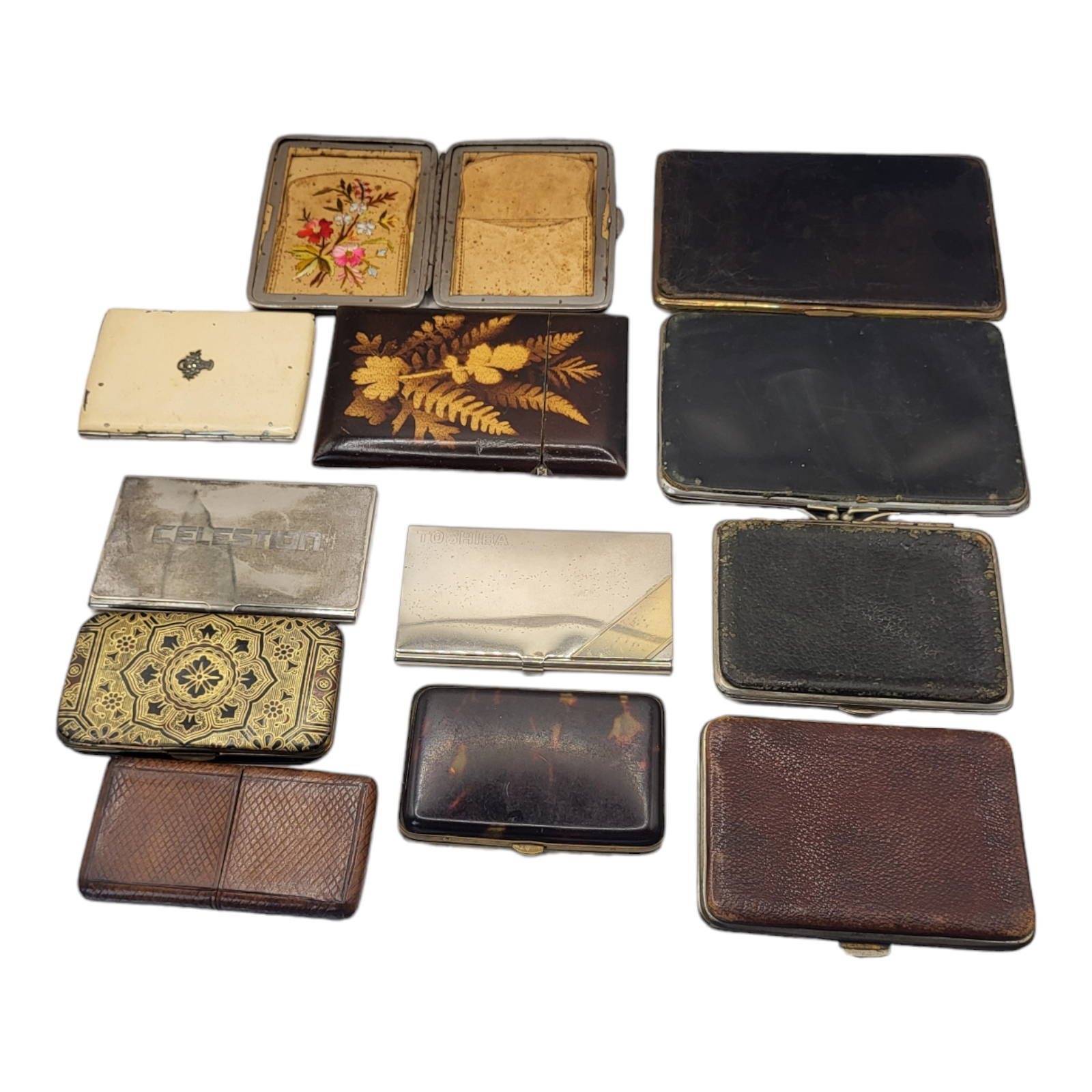 A COLLECTION OF SEVEN EARLY 20TH CENTURY LADIES’ LEATHER BOUND CARD CASES, CIRCA 1900 - 1920 Three