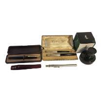 PARKER 51, A VINTAGE FOUNTAIN PEN AND PENCIL SET Black lacquer body in fitted velvet lined box,