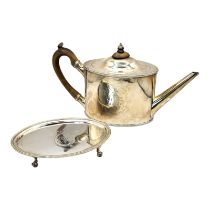 A GEORGIAN SILVER OVAL TEAPOT AND STAND With carved wood handle,finial and beaded edge ,the tray