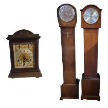 AN EARLY 20TH CENTURY GERMAN OAK MANTLE CLOCK Architectural form with dome top and carved