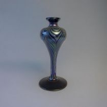 A 20TH CENTURY ART GLASS VASE Globular form with iridescent decoration, engraved mark to base. (
