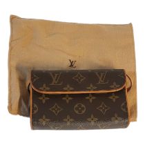 LOUIS VUITTON, A VINTAGE BROWN LEATHER CLUTCH PURSE Having a single handle and LV monogram, in a