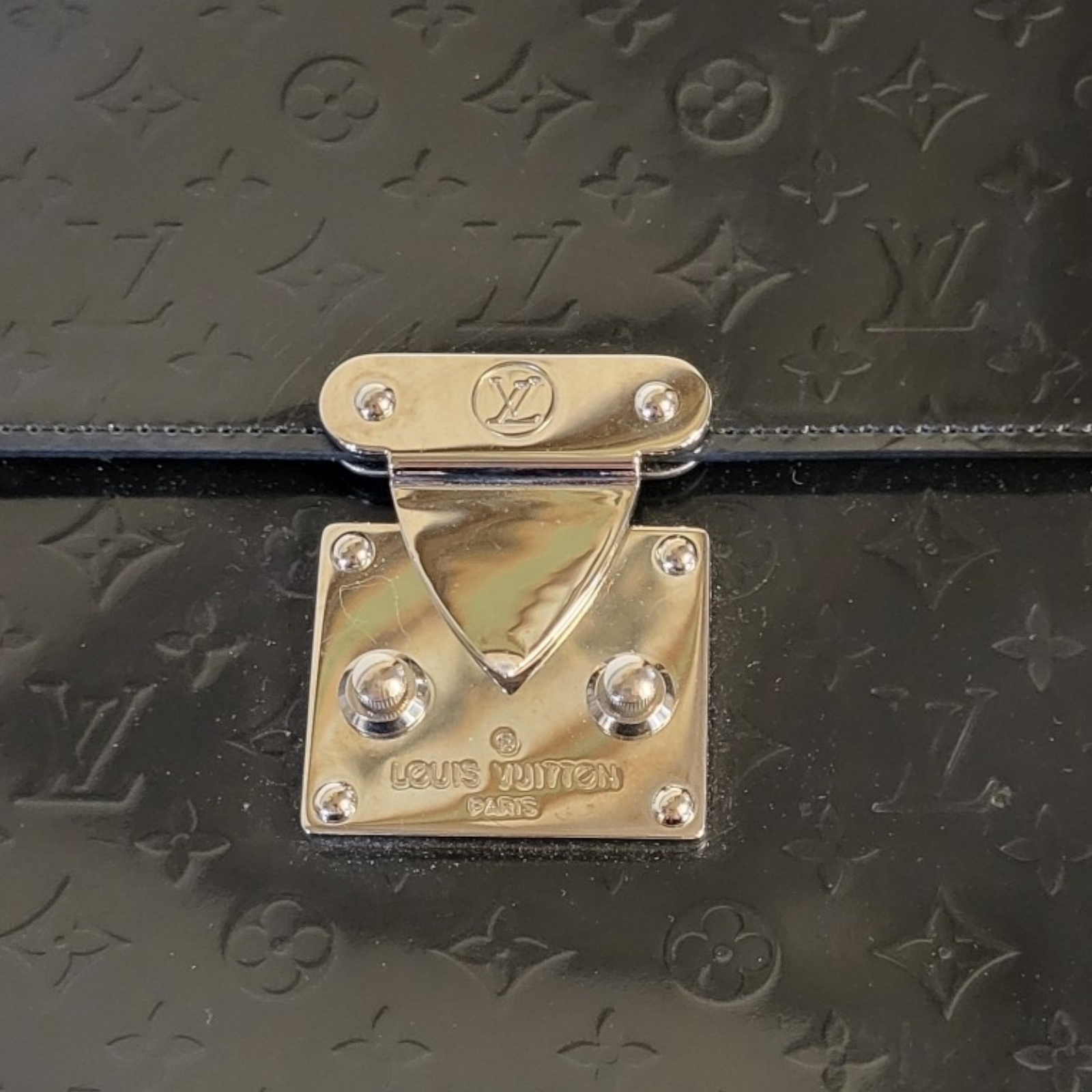 LOUIS VUITTON, A BLACK LEATHER HANDBAG Having a single handle and LV monogram design, in a brown - Image 4 of 9