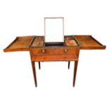 A GEORGE III MAHOGANY INLAID GENTLEMAN’S DRESSING TABLE The rectangular double hinged top opening to