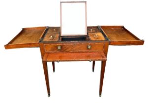 A GEORGE III MAHOGANY INLAID GENTLEMAN’S DRESSING TABLE The rectangular double hinged top opening to