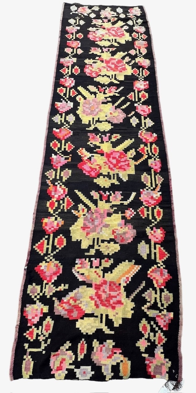 BESSARABIAN CIRCA 1880, ALL WOOL CARPET RUNNER with floral decoration. (378 x 107cm)
