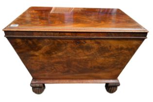 MANNER OF GILLOWS, AN EARLY 19TH CENTURY FLAME MAHOGANY WINE COOLER The hinge lid opening to